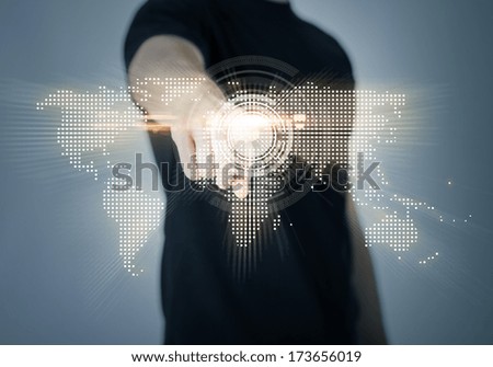 Communication Concept - Closeup Of Man Pointing His Finger At World Map
