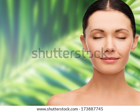 Health, Spa And Beauty Concept - Clean Face Of Beautiful Young Woman With Closed Eyes