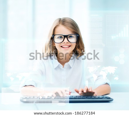 education, school and future technology concept - little student girl with keyboard and virtual screen at school