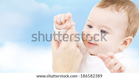 child, happiness and people concept - adorable baby boy
