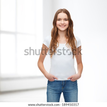 t-shirt design concept - smiling teenager in blank white t-shirt