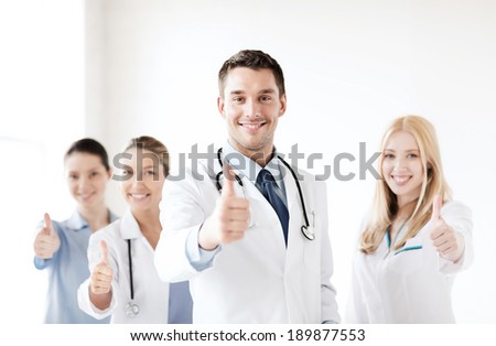 healthcare and medical professional young team or group of doctors showing thumbs up healthcare and medical professional young team or group of doctors showing thumbs up