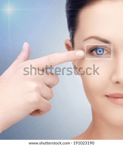 health, vision, sight, future technology concept - woman eye with laser correction frame