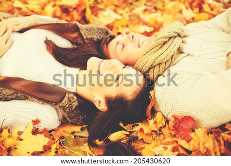 holidays love travel tourism relationship and dating concept romantic couple in the autumn park holidays love travel tourism relationship and dating concept romantic couple in the autumn park