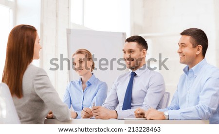 business, career and office concept - smiling businesswoman at job interview in office