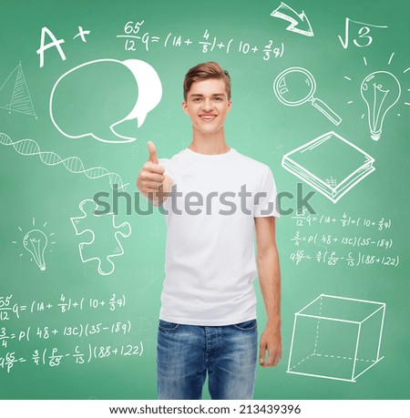 gesture, advertising, education, school and people concept - smiling young man in blank white t-shirt showing thumbs up over green board background with doodles