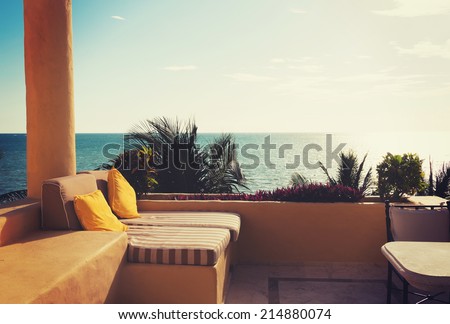 vacation, home and travel concept - sea view from balcony of home or hotel room