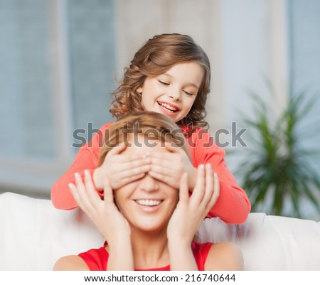 picture of mother and daughter making a joke