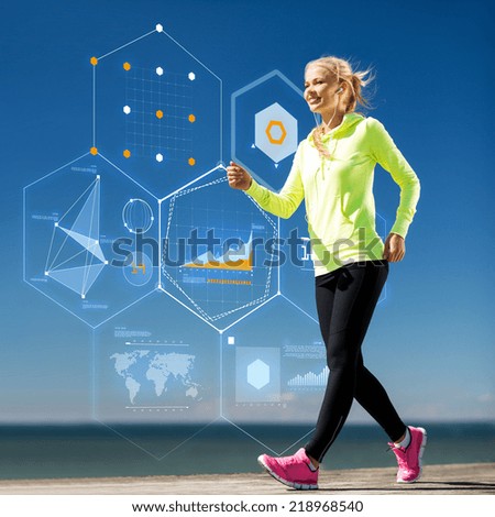 sport, training, technology and lifestyle concept - smiling young woman running outdoors