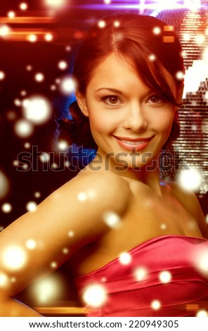 luxury, vip, nightlife, party, christmas, x-mas, new year\'s eve concept - beautiful woman in evening dress with disco ball