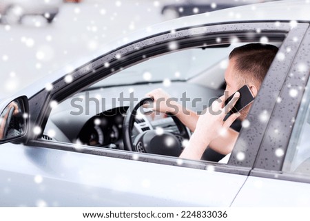 transportation, people, technology and vehicle concept - close up of man using smartphone while driving car