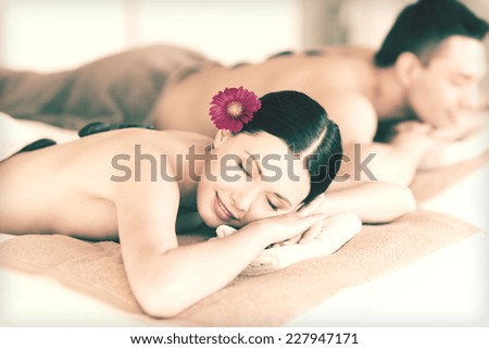 picture of couple in spa salon with hot stones