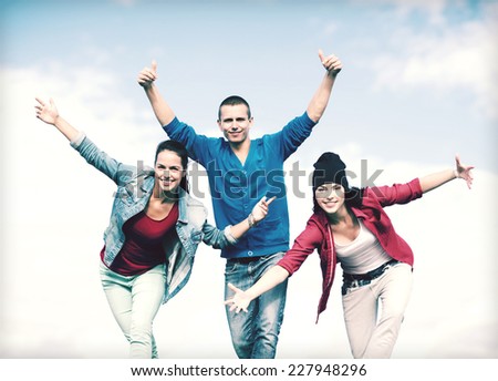 sport, dancing and urban culture concept - group of teenagers dancing