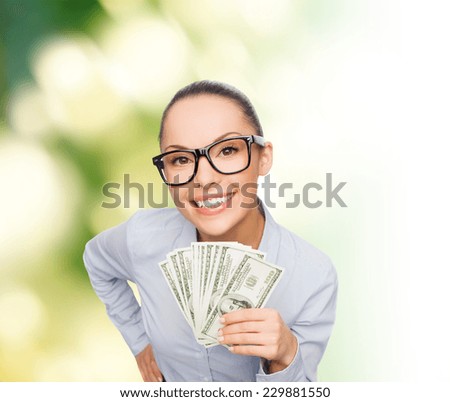 business, money, nature and banking concept - smiling businesswoman in eyeglasses with dollar cash money
