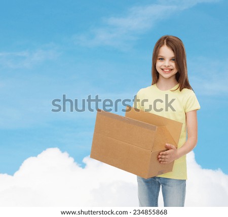 advertising, childhood, delivery, mail and people - smiling little girl holding open cardboard box over blue background