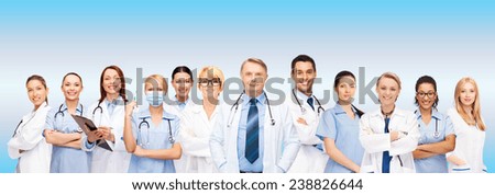 medicine and healthcare concept - team or group of doctors and nurses
