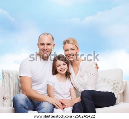 family, childhood and people concept - smiling mother, father and little girl over blue sky background