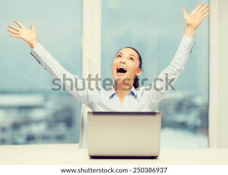business, technology and office concept - screaming businesswoman with laptop in office