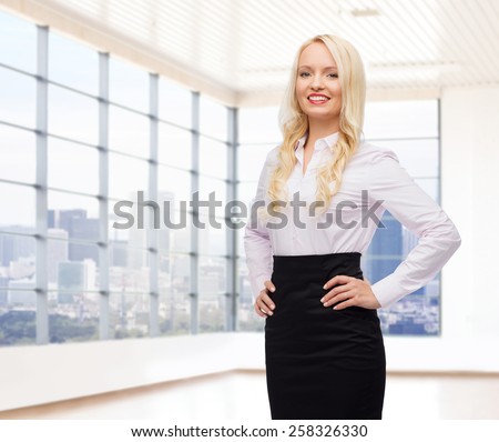 business, style and people concept - smiling businesswoman over office room with city view window background