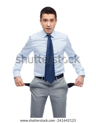 business, people, emotions, bankruptcy and failure concept - surprised businessman showing empty pockets