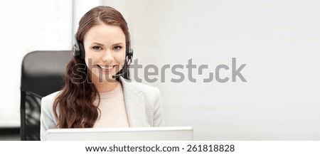 office and technology concept - picture of helpline operator with laptop computer