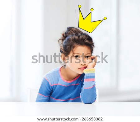 people, childhood and emotions concept - sad or bored little girl over living room background and crown doodle