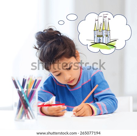 people, childhood, creativity and imagination concept - happy little girl drawing with crayons and dreaming about fairytale castle at home or art school