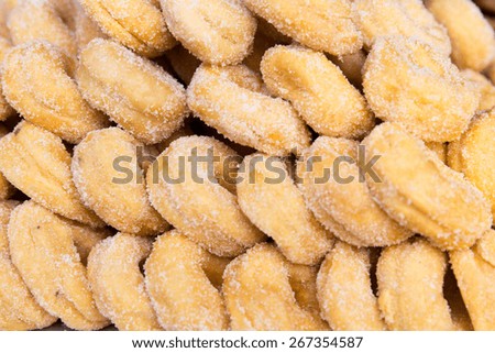 cooking, asian kitchen, sale and food concept - sugared donuts texture