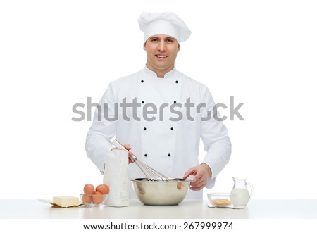 cooking, profession, haute cuisine, food and people concept - happy male chef cook baking