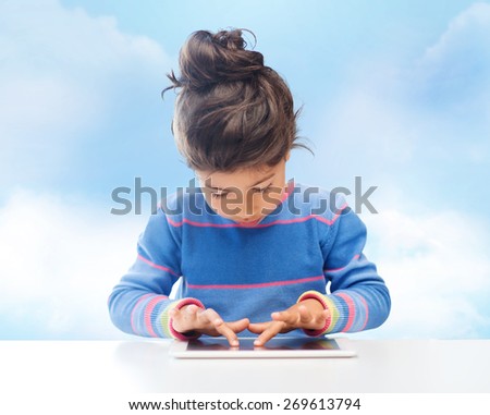 education, technology and children concept - little student girl with tablet pc over blue sky background