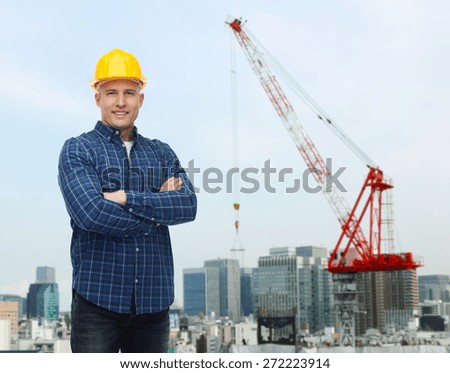 repair, construction, building, people and maintenance concept - smiling male builder or manual worker in helmet over city construction site background