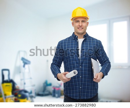 repair, construction, building, people and maintenance concept - smiling male builder or manual worker in helmet with blueprint and clipboard over room with work equipment background