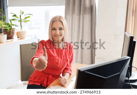 business, startup and people concept - happy businesswoman or creative female office worker with computers