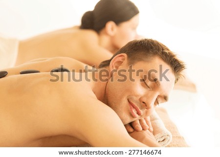 picture of couple in spa salon with hot stones
