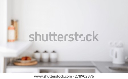 interior and cooking concept - blurred kitchen interior background with copyspace