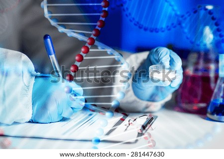 science, chemistry, medicine and people concept - close up of young scientist with chemical sample taking notes on clipboard and making test or research in laboratory over dna molecule structure