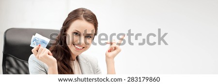 online banking concept - picture of happy woman with laptop computer and euro cash money