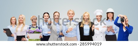people, profession, employment, compensation and finances concept - happy businesswoman holding dollar money with group of professional workers over blue background