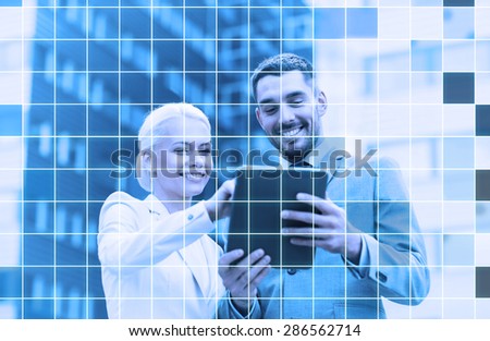 business, partnership, technology and people concept - smiling businessman and businesswoman with tablet pc computer over blue office building and grid background