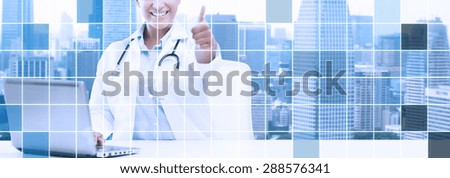 healthcare, medical and technology concept - happy african american female doctor with laptop pc computer showing thumbs up over city and blue grid background