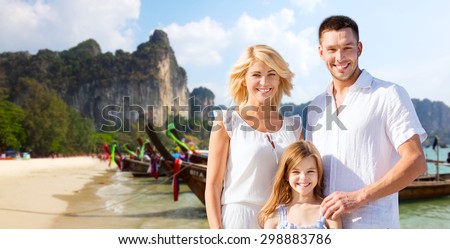 summer holidays, travel, tourism, children and people concept - happy family over beach in thailand or bali background