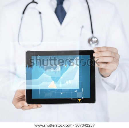 medicine, technology and people concept - close up of doctor holding tablet pc with graph on screen
