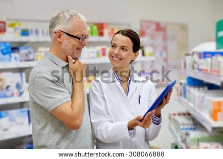 medicine, pharmaceutics, health care and people concept - happy pharmacist with tablet pc computer and senior man customer at drugstore