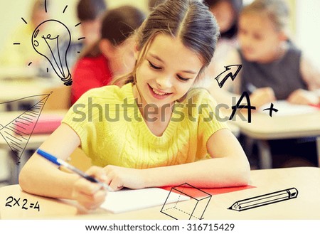 education, elementary school, learning and people concept - group of school kids with notebooks writing test in classroom over doodles