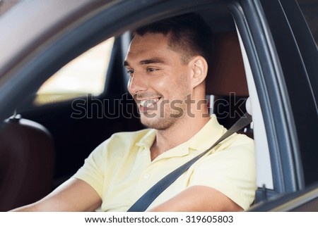 road trip, transport, leisure and people concept - happy smiling man driving car outdoors