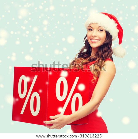 shopping, sale, gifts, christmas, x-mas concept - smiling woman in santa helper hat with percent sign