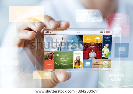 business, technology and people concept - close up of male hand holding and showing transparent smartphone news web page on screen