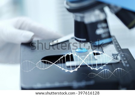 science, chemistry, biology, medicine and people concept - close up of scientist hand with test sample making research in clinical laboratory with dna molecule structure