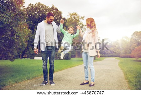 family, parenthood, adoption and people concept - happy mother, father and little girl walking in summer park and having fun