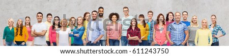 diversity, race, ethnicity and people concept - international group of happy smiling men and women over gray concrete background